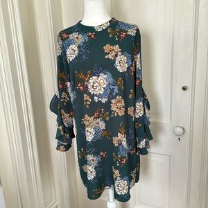 Career dress, stunning design with dramatic ruffled sleeves, designed in Cal. L